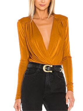 Free People x Revolve Turnt Bodysuit in Honey Ginger.